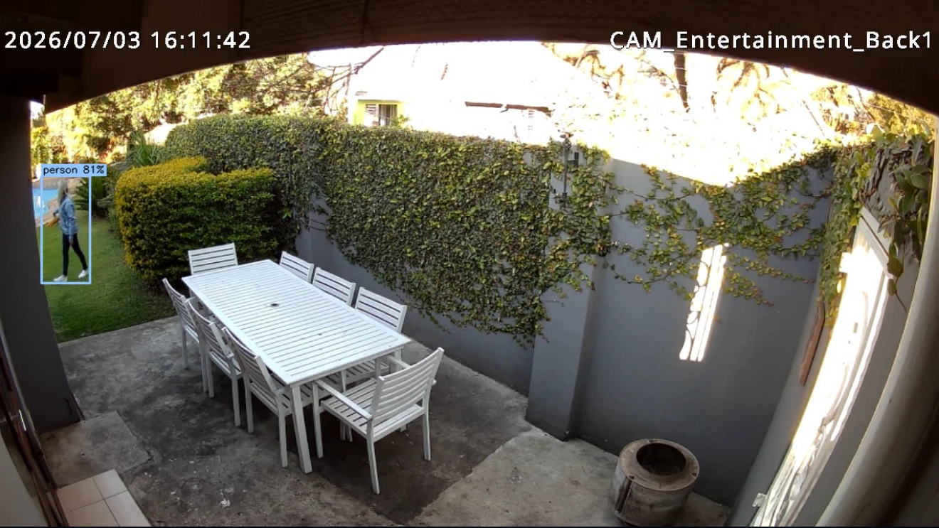 AI detects a person on the patio — bounding box with confidence score
